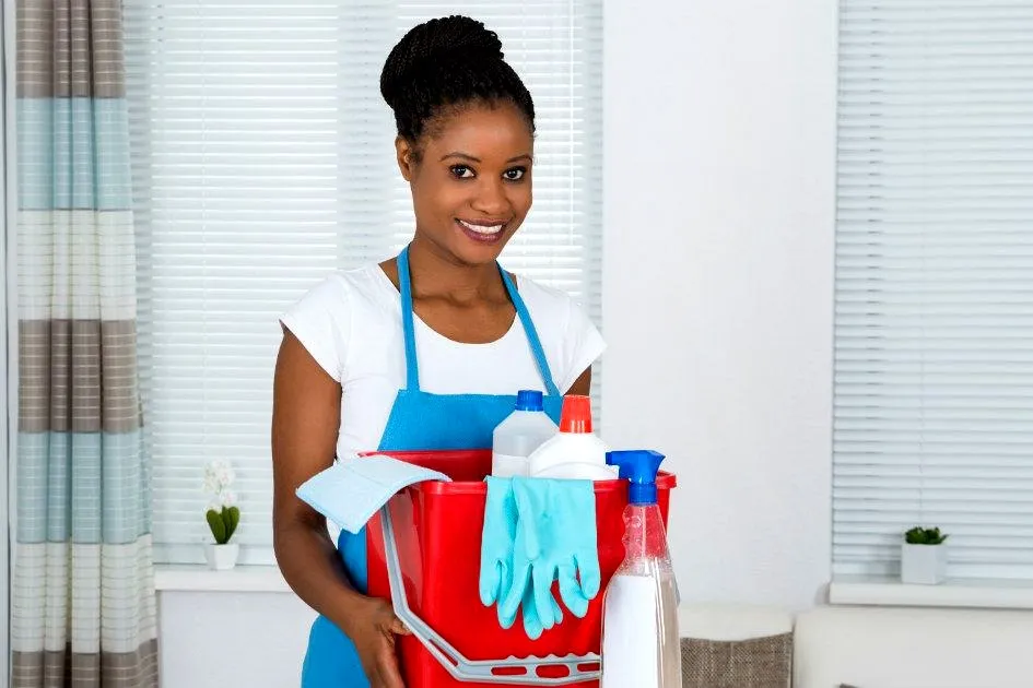 A Kenyan housemaid ready for domestic work in a family home